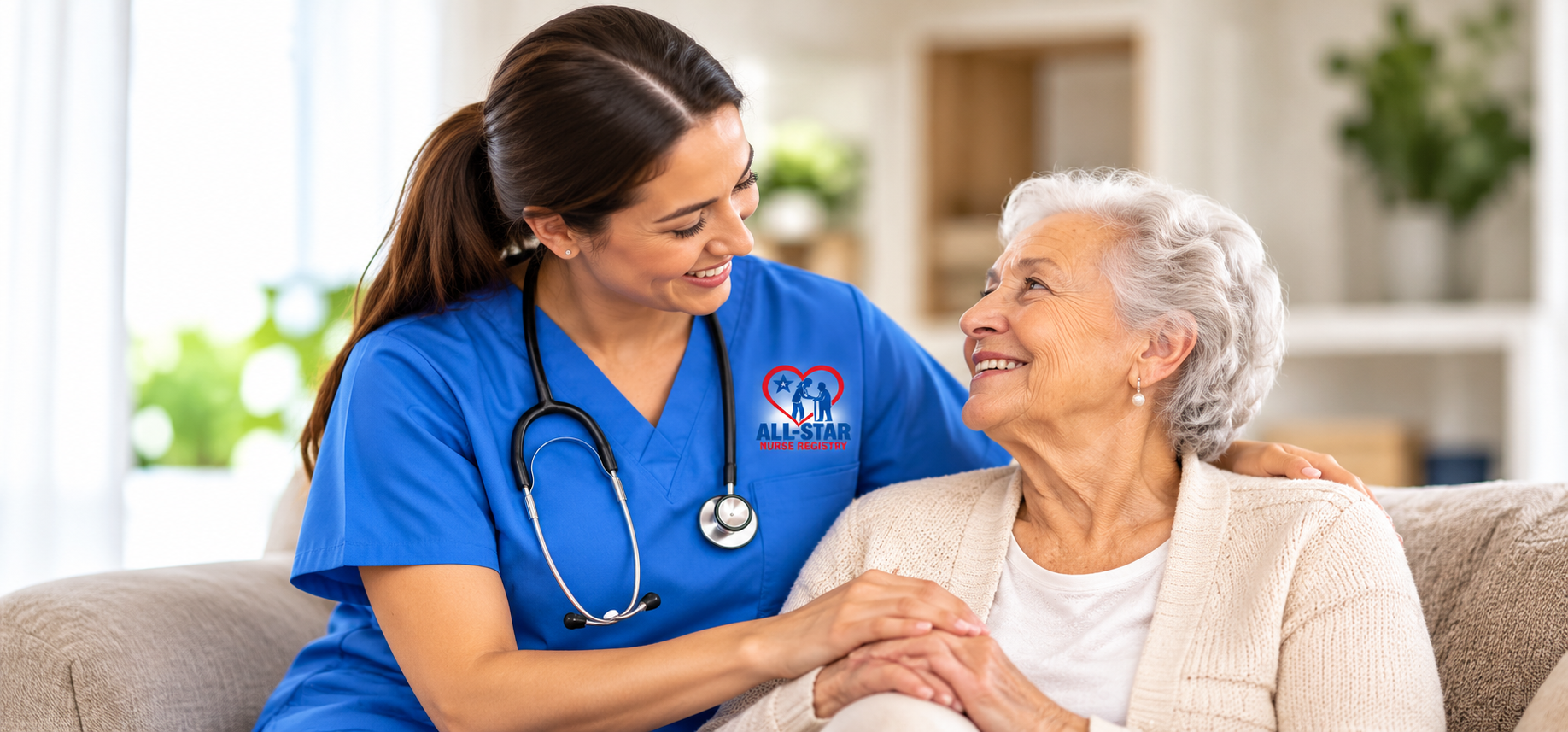 A nurse talks with an older woman in her home